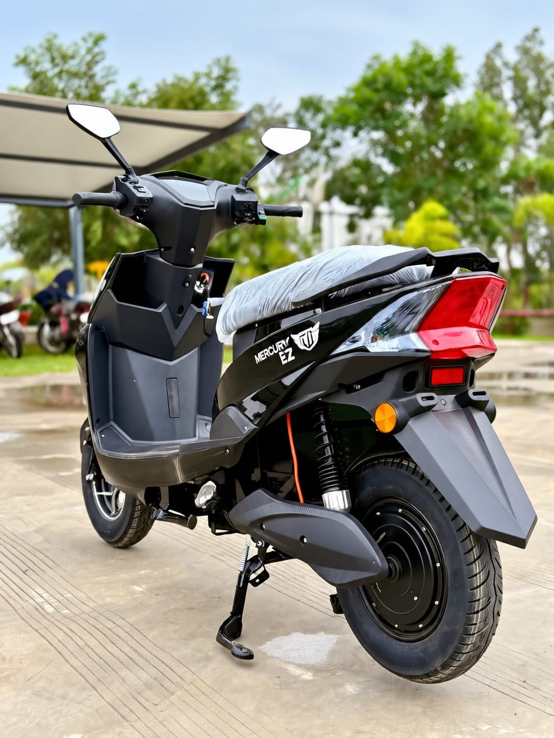 EZ Non-RTO Top Model electric scooter in gloss black, rear view