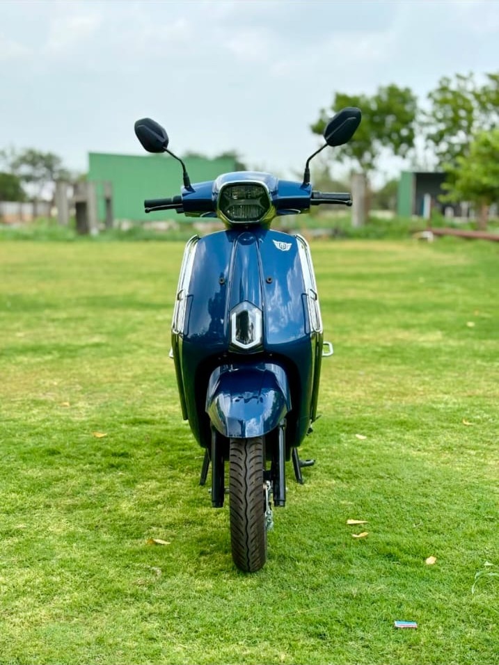 DLX Non-RTO electric scooter in royal blue, front view